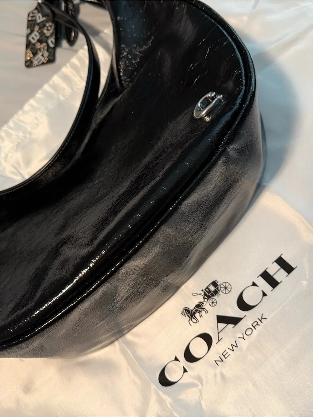 Coach shiny black